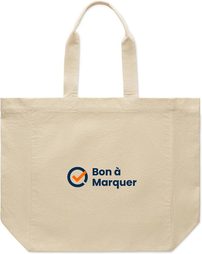 Le logo Bon à Marquer imprimé sur le devant d'un tote bag en coton écru, à 174 millimètres de large.